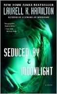 Book cover image of Seduced by Moonlight (Meredith Gentry Series #3) by Laurell K. Hamilton