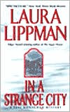 Book cover image of In a Strange City (Tess Monaghan Series #6) by Laura Lippman