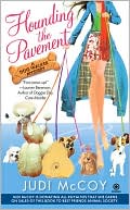 Book cover image of Hounding the Pavement (Dog Walker Mystery Series #1) by Judi McCoy