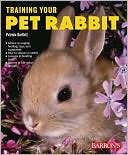 Book cover image of Training Your Pet Rabbit by Patricia Bartlett