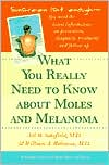 Book cover image of What You Really Need to Know about Moles and Melanoma by Jill R. Schofield