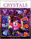 Book cover image of The Illustrated Guide to Crystals by Judy Hall