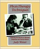 Book cover image of Phototherapy Techniques: Exploring the Secrets of Personal Snapshots and Family Albums by Judy Weiser