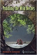 Book cover image of Paddling the Wild Neches by Richard M. Donovan
